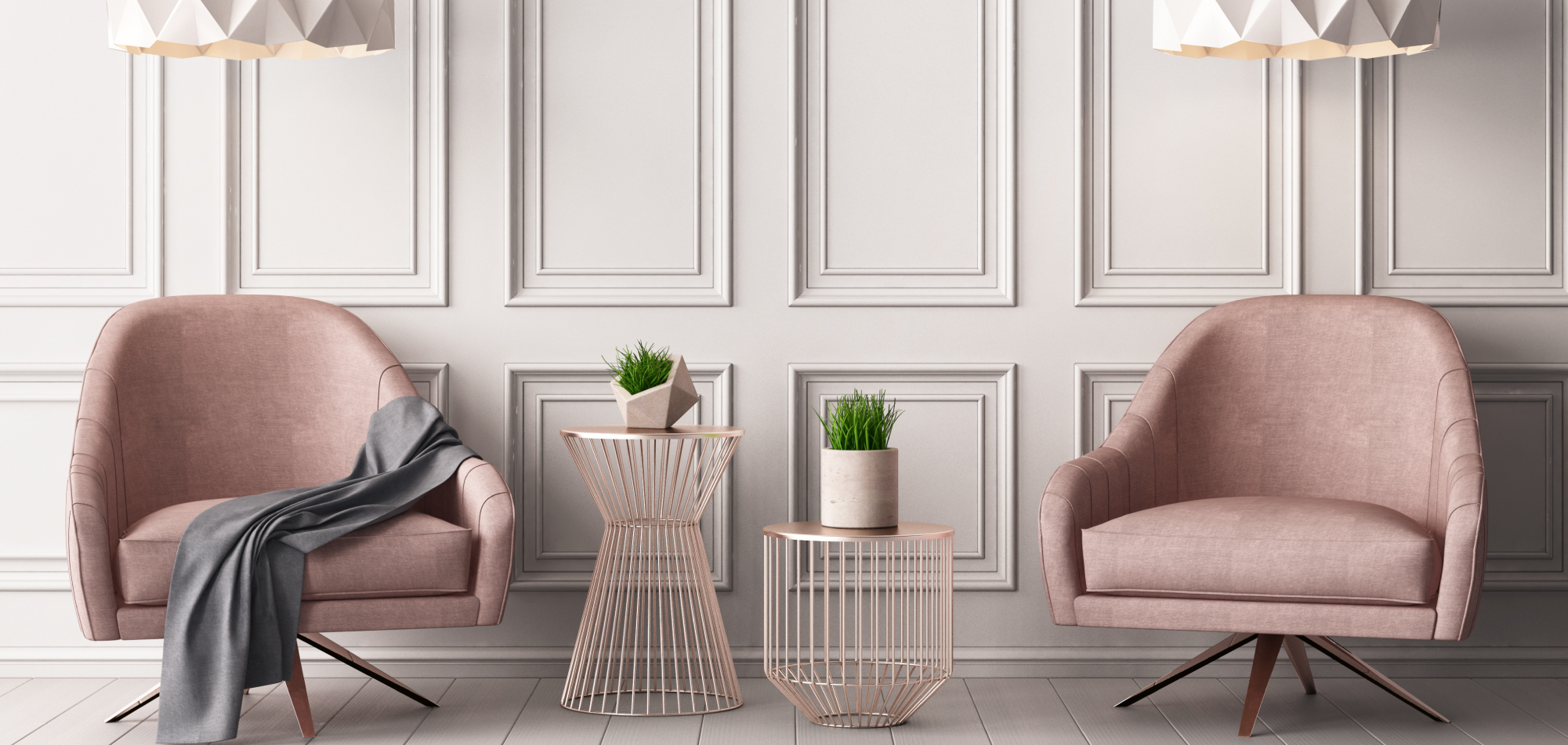 Dos sillones y mesitas decorados con home staging
